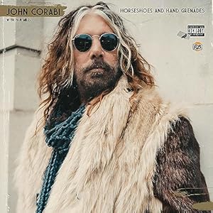 Horseshoes and Hand Grenades: Tales from the Other Mötley Crüe Frontman and Journeys through a Life In and Out of Rock and Roll audiobook cover